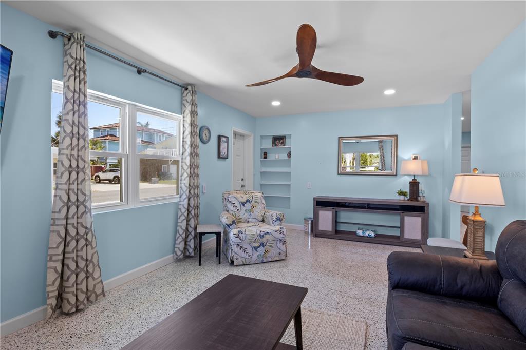 204 29th Street Holmes Beach, FL 34217 - Photo 14 of 38 a living room with furniture and a window