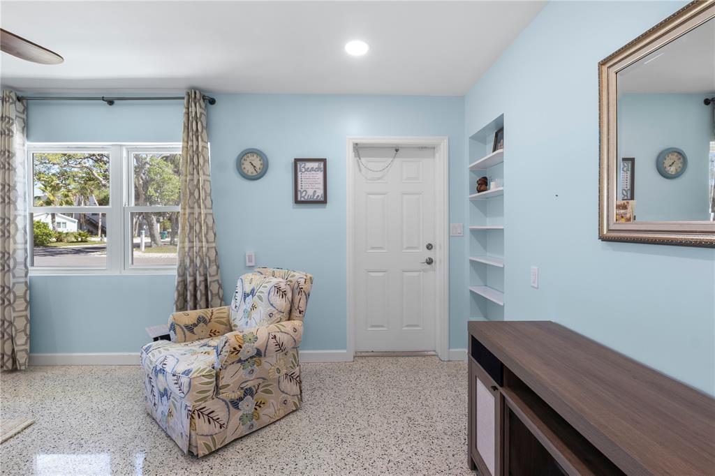204 29th Street Holmes Beach, FL 34217 - Photo 15 of 38 a room with furniture and window