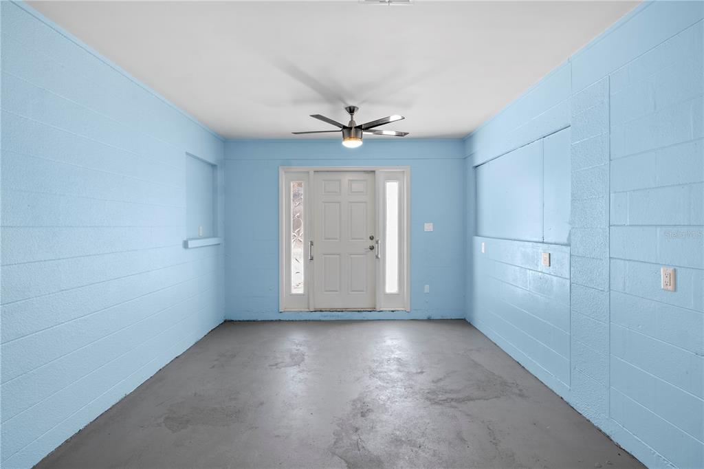 204 29th Street Holmes Beach, FL 34217 - Photo 27 of 38 an empty room with a window and a ceiling fan