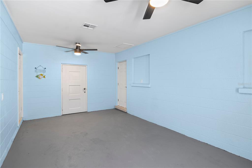 204 29th Street Holmes Beach, FL 34217 - Photo 28 of 38 an empty room with a empty space