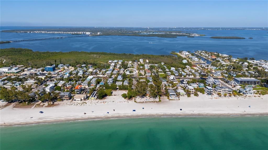 204 29th Street Holmes Beach, FL 34217 - Photo 37 of 38 a view of an ocean beach and outdoor space