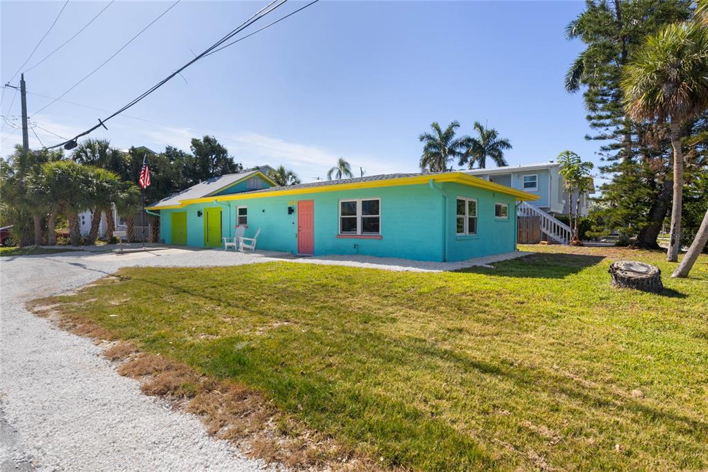 204 29th Street Holmes Beach, FL 34217 - Photo 6 of 38 a view of a house with a yard
