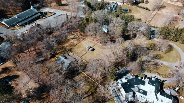 an aerial view of residential house with parking space