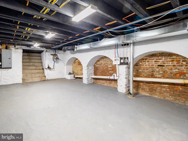 a view of garage with stairs