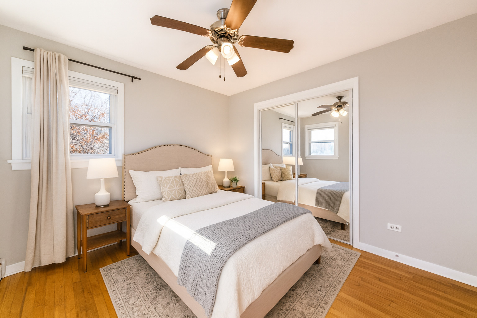 2245 Des Plaines Avenue, Unit B North Riverside, IL 60546 - Photo 11 of 22 a bedroom with a bed and wooden floor