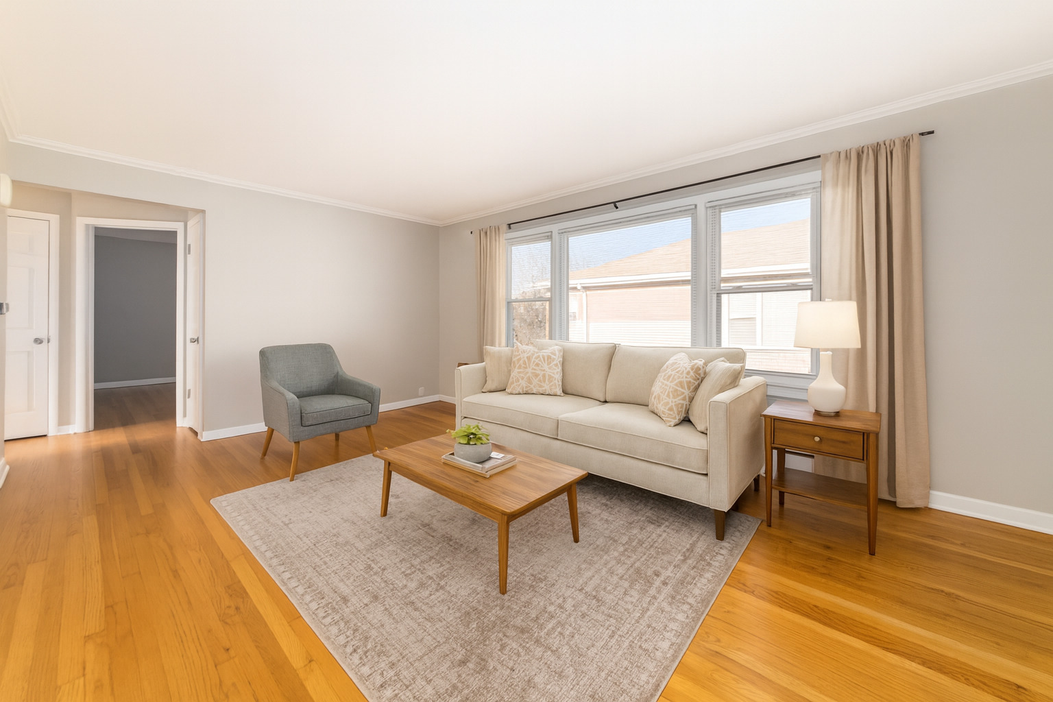 2245 Des Plaines Avenue, Unit B North Riverside, IL 60546 - Photo 4 of 22 a living room with furniture and a large window