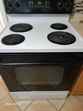 a close view of stove top oven and microwave