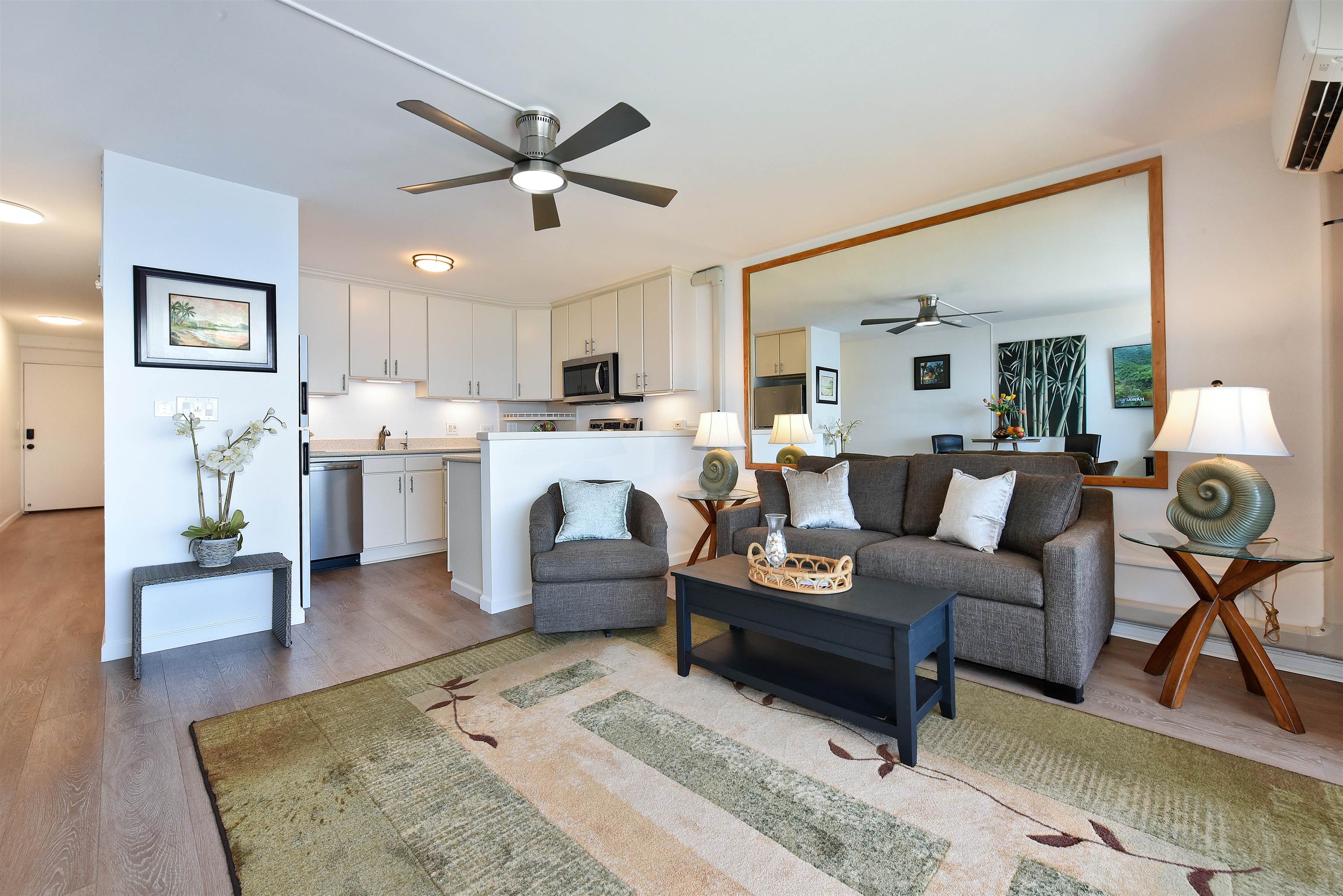 1403 Front Street, Unit 308 Lahaina, HI 96761 - Photo 10 of 35 a living room with furniture and kitchen view