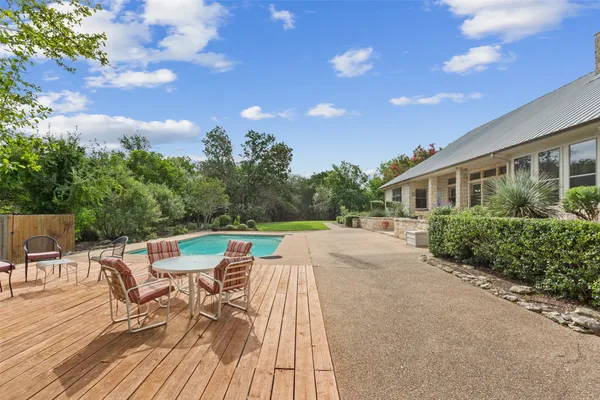 a view of house with patio outdoor seating and entertaining space