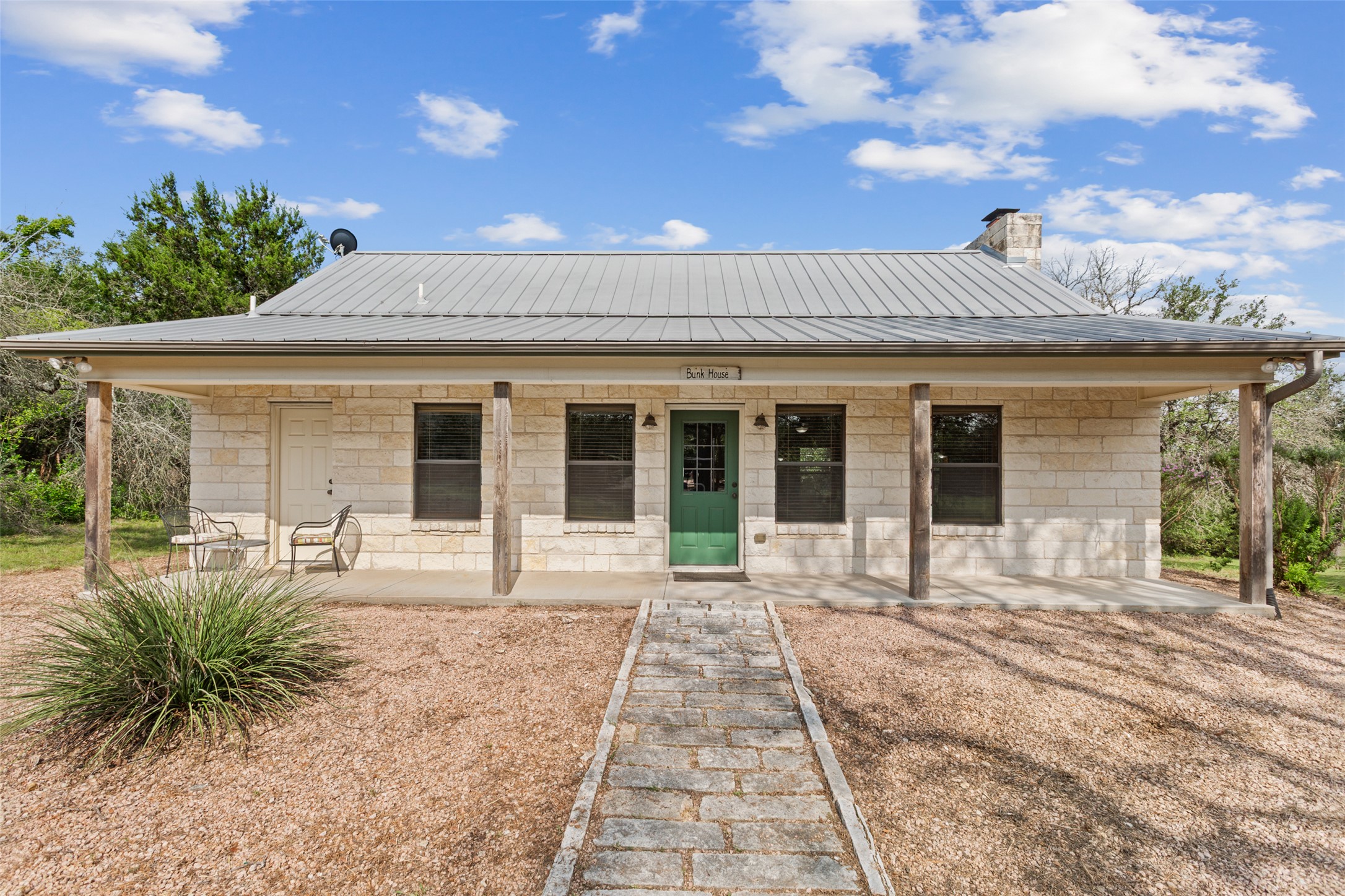 13730 Settlements Road Salado, TX 76571 - Photo 23 of 40 a front view of house with yard and seating