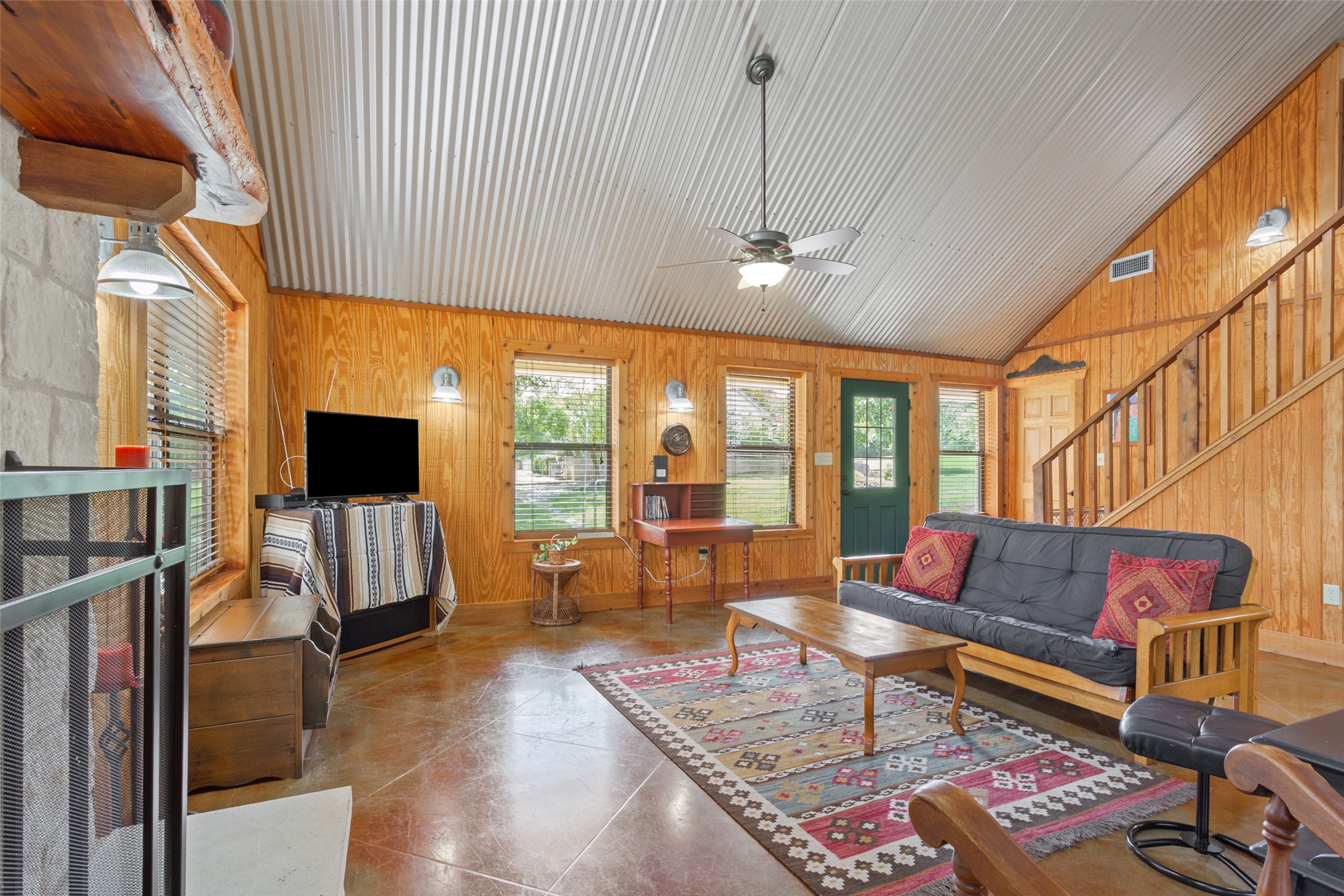 13730 Settlements Road Salado, TX 76571 - Photo 25 of 40 a living room with furniture and a flat screen tv