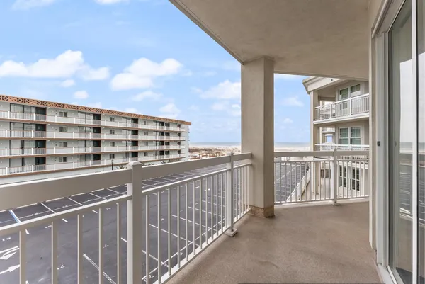 a view of a balcony with city view