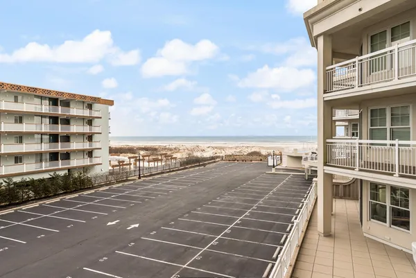 a view of a balcony with ocean view