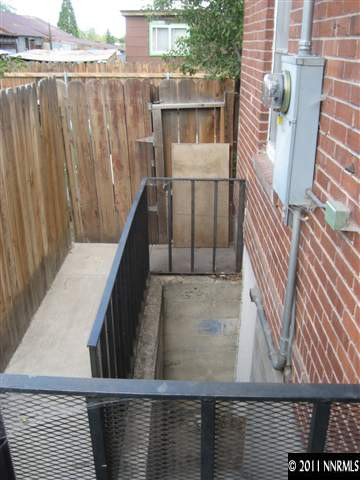 415 West 9th Street Reno, NV 89503 - Photo 11 of 13 a view of balcony with wooden floor and stairs