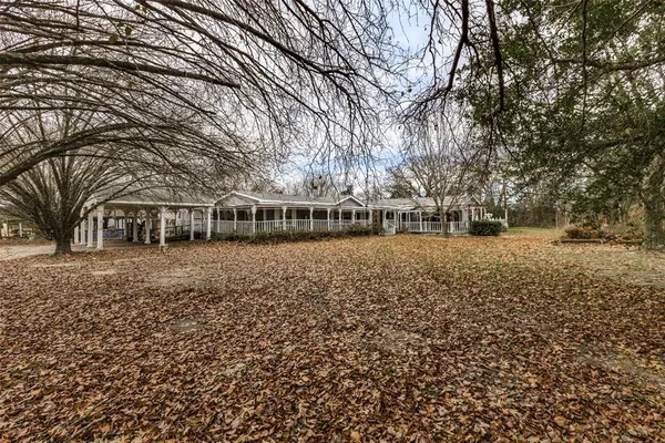 a view of house with outdoor space