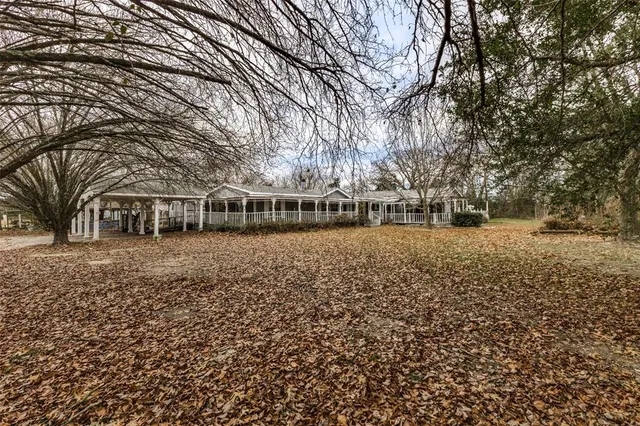 a view of house with outdoor space
