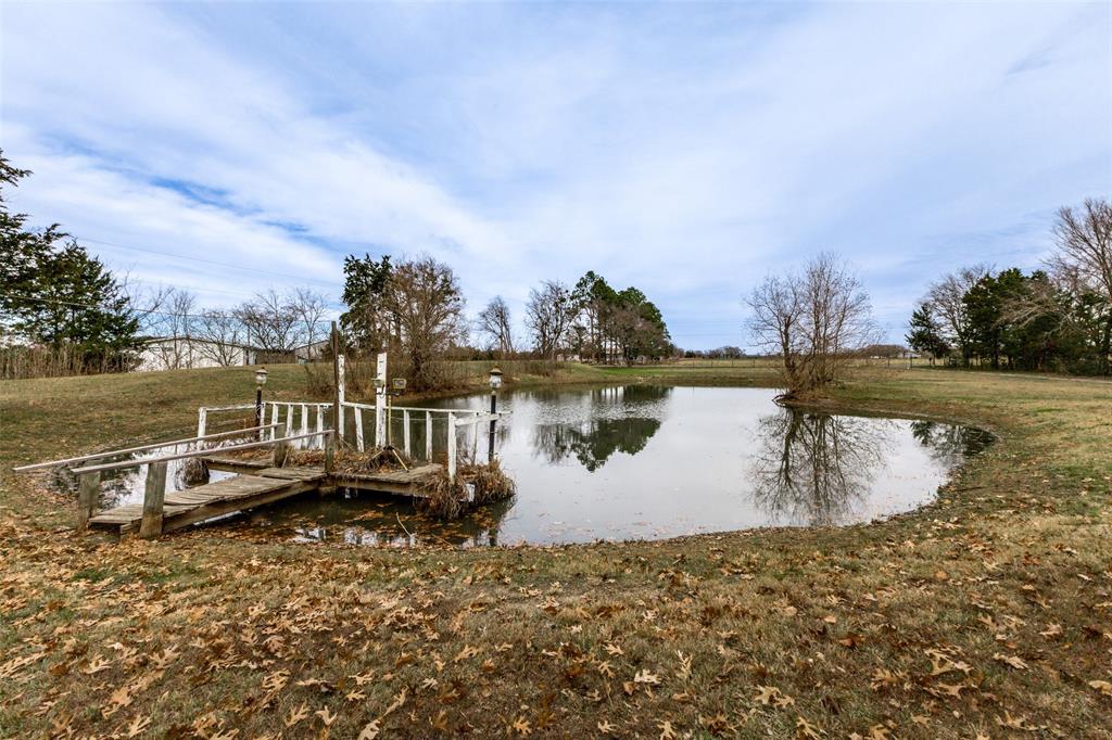 9459 County Road 313 Terrell, TX 75161 - Photo 4 of 13 Pond with fishing pier