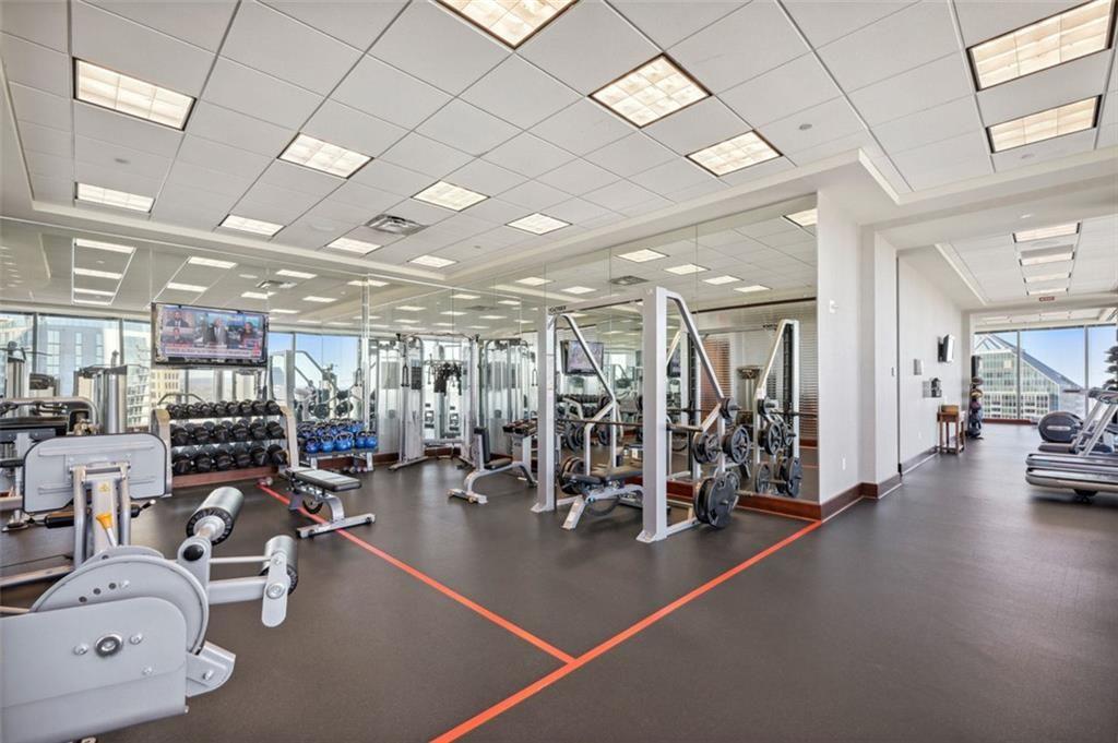 3344 Peachtree Road Northeast, Unit 4104 Atlanta, GA 30326 - Photo 22 of 30 a view of a room with gym equipment