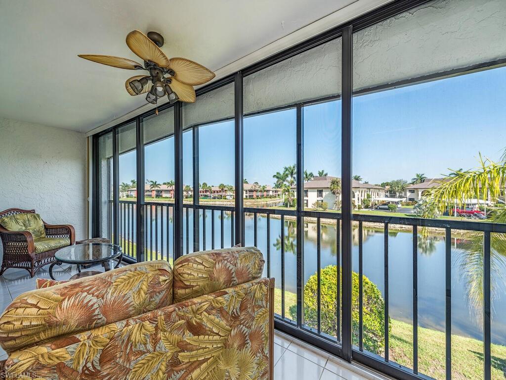 5590 Rattlesnake Hammock Road, Unit M203 Naples, FL 34113 - Photo 15 of 22 a view of a balcony