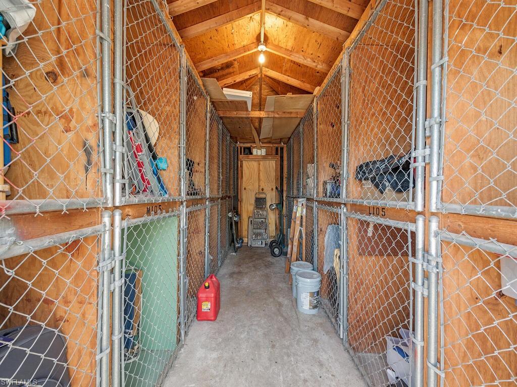 5590 Rattlesnake Hammock Road, Unit M203 Naples, FL 34113 - Photo 22 of 22 a view of an outdoor space