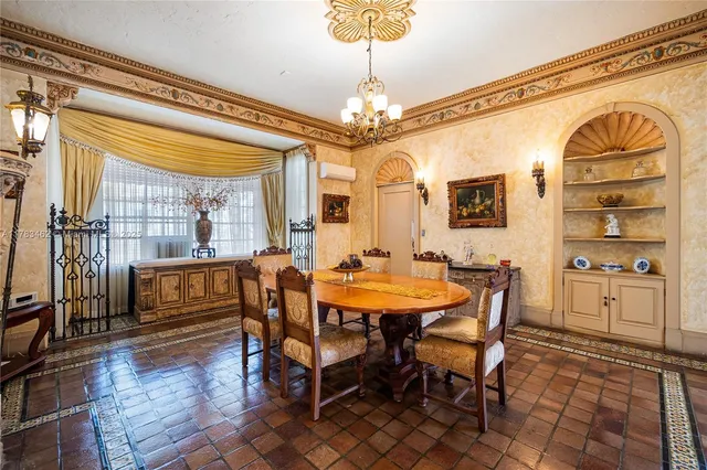 a spacious bedroom with a bed and a fireplace