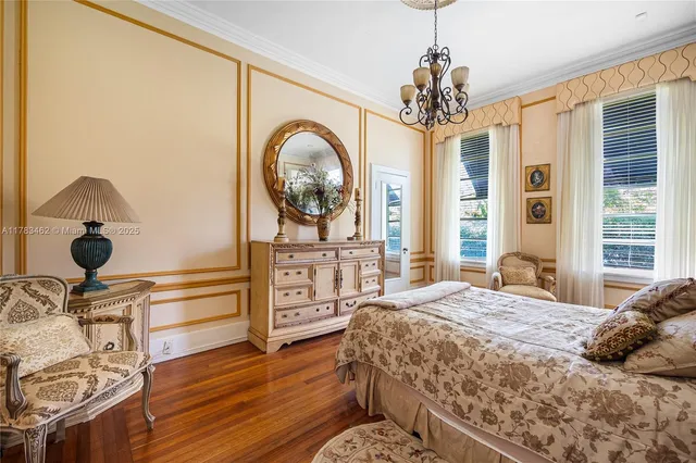 a bathroom with a toilet a sink and a mirror