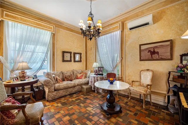 a view of a chair and table in the garden