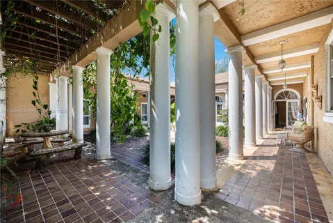 a view of a swimming pool with lounge chair