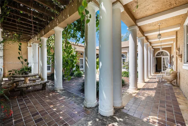 a view of a swimming pool with lounge chair