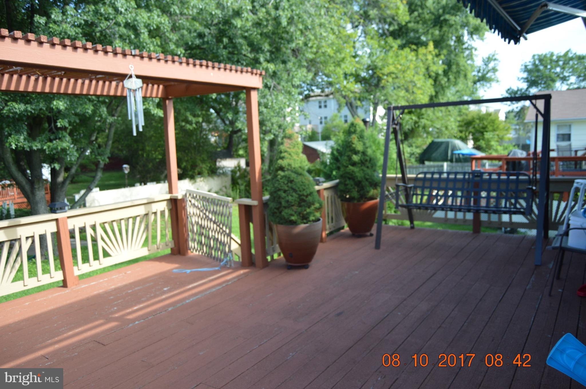 17 Rollwin Road Baltimore, MD 21244 - Photo 12 of 29 a view of a two chairs in the deck
