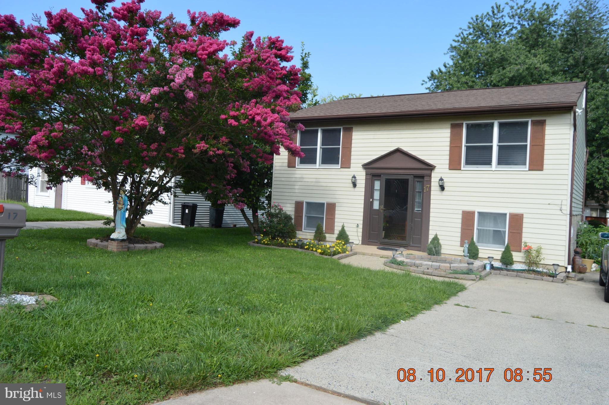 17 Rollwin Road Baltimore, MD 21244 - Photo 2 of 29 a front view of house with yard and green space