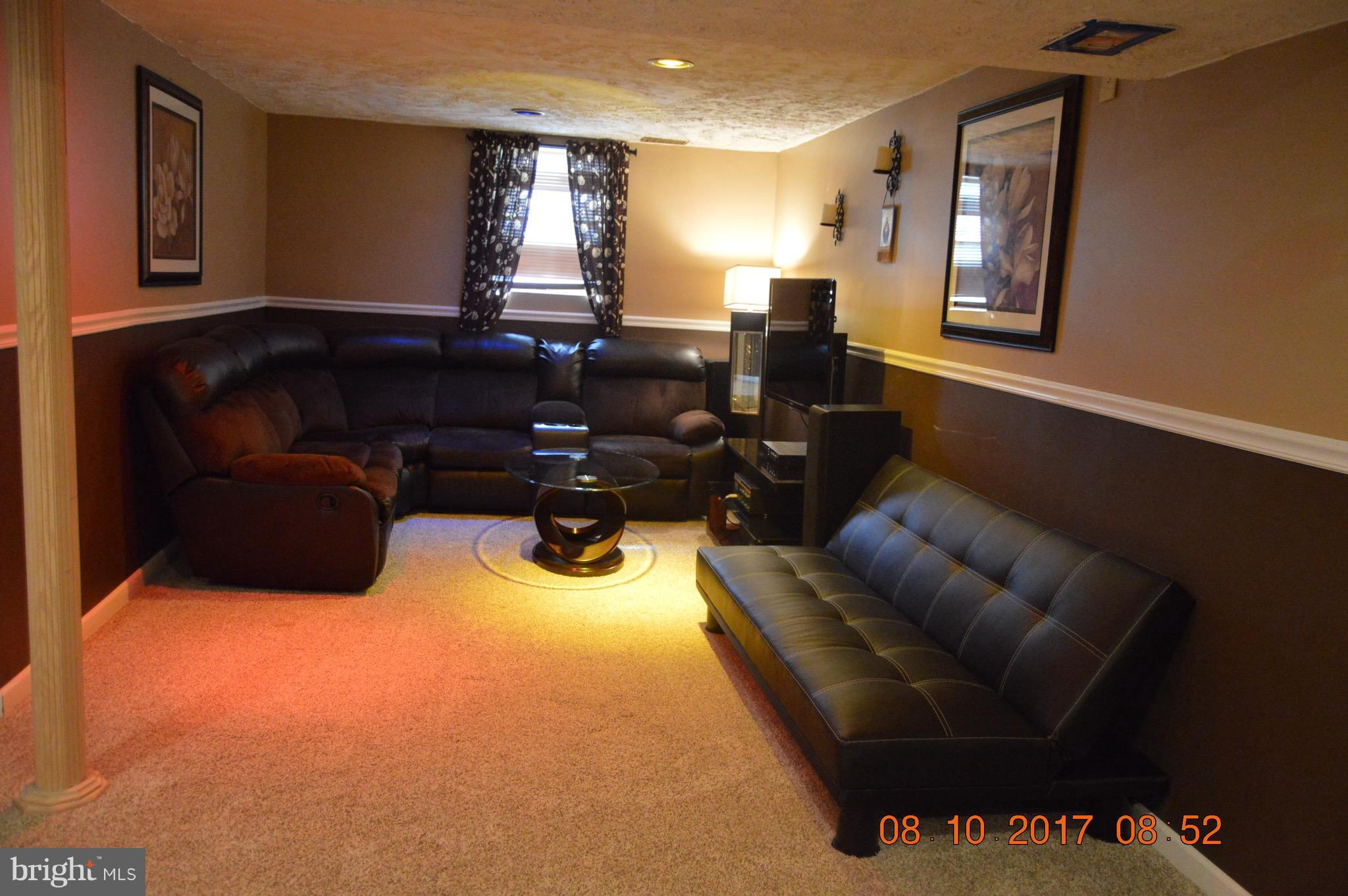 17 Rollwin Road Baltimore, MD 21244 - Photo 21 of 29 a living room with furniture and a window