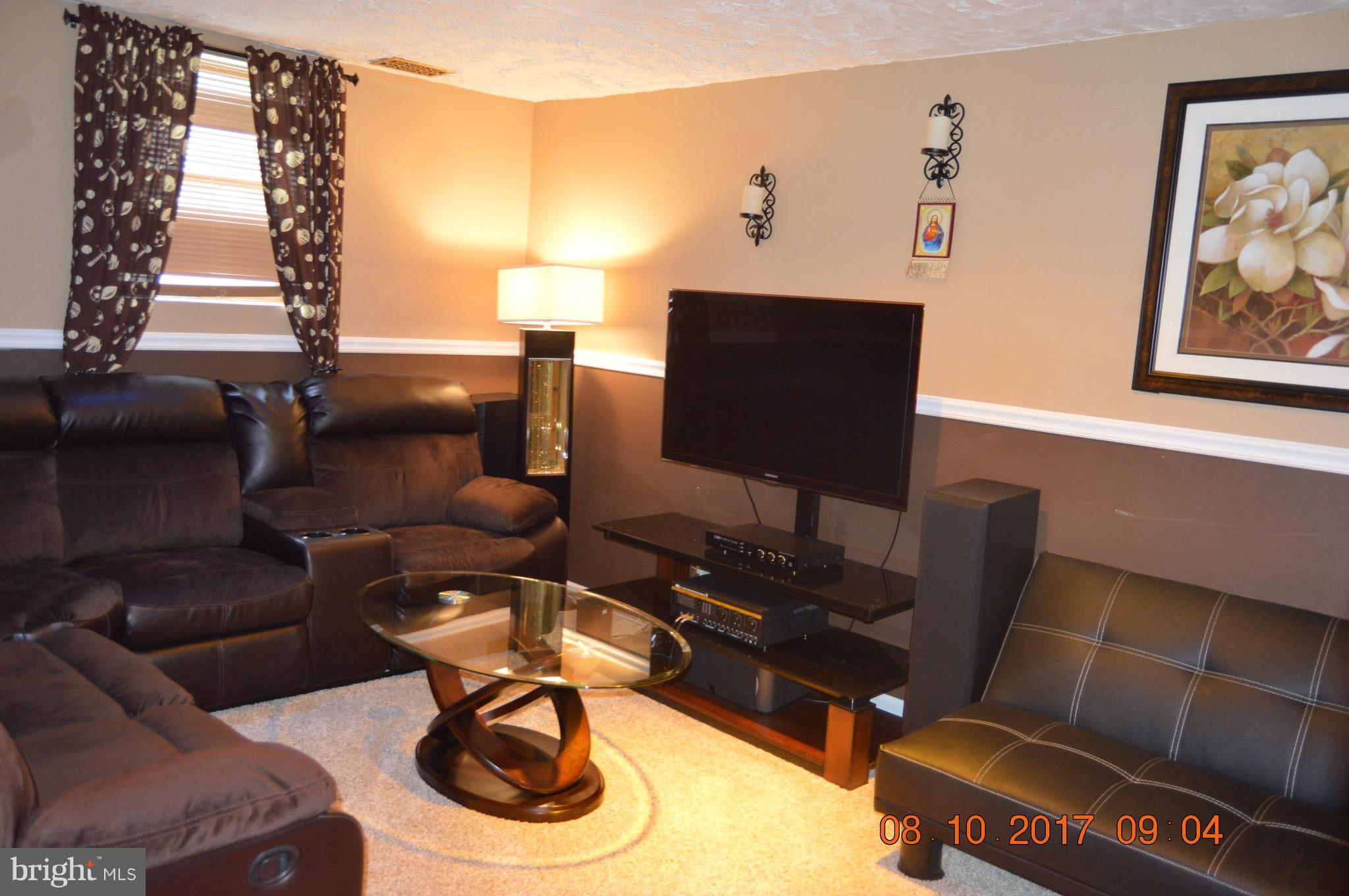 17 Rollwin Road Baltimore, MD 21244 - Photo 22 of 29 a work room with furniture and a large window