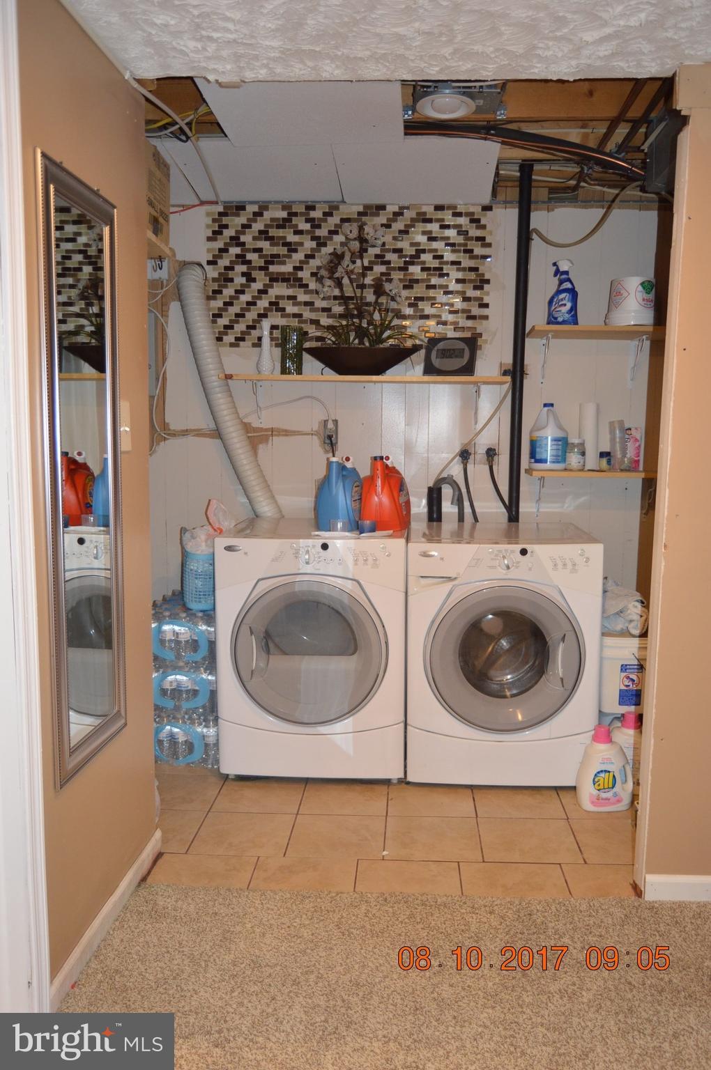 17 Rollwin Road Baltimore, MD 21244 - Photo 27 of 29 a utility room with dryer and washer