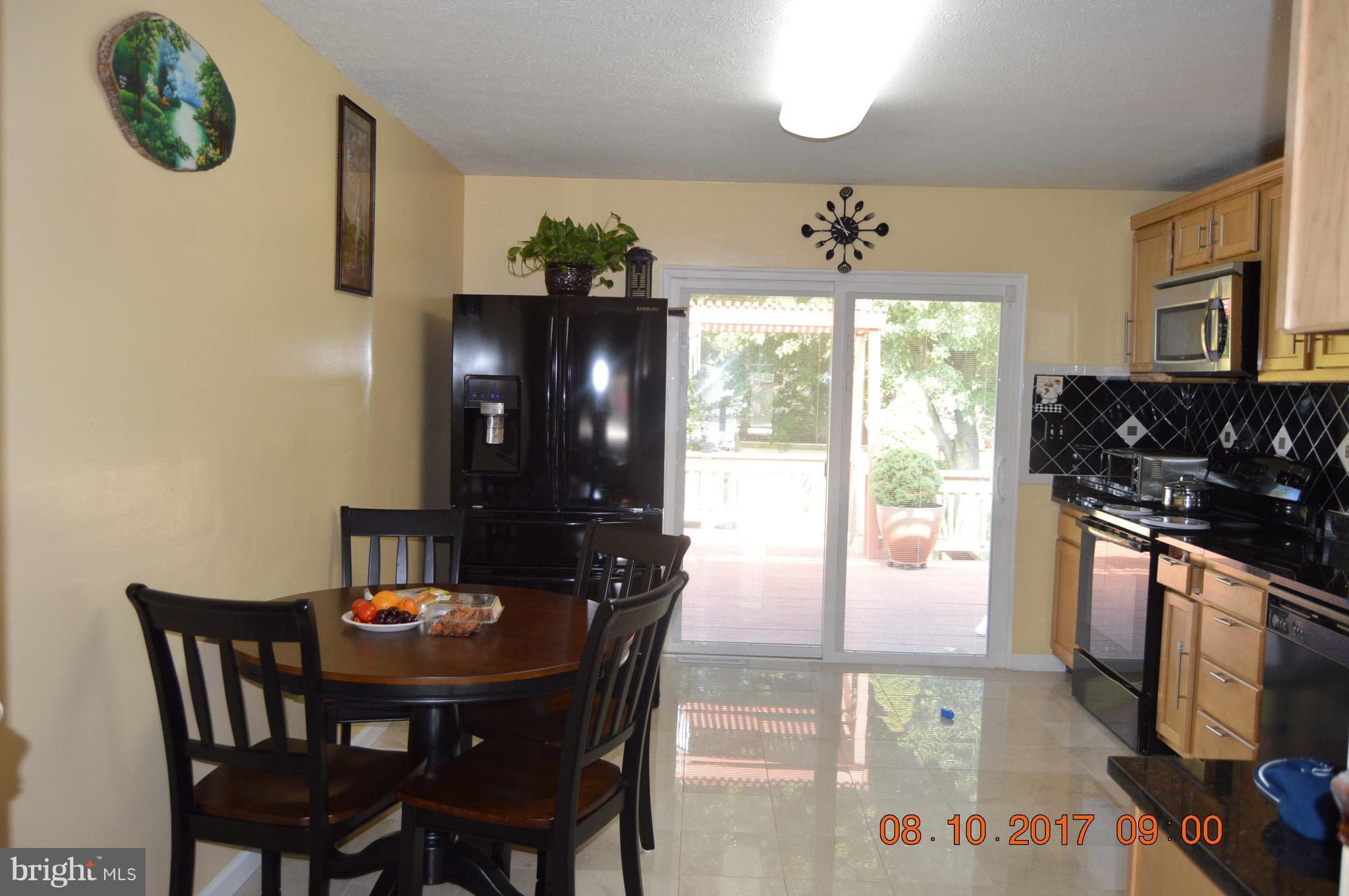 17 Rollwin Road Baltimore, MD 21244 - Photo 9 of 29 a view of a dining room with furniture and window