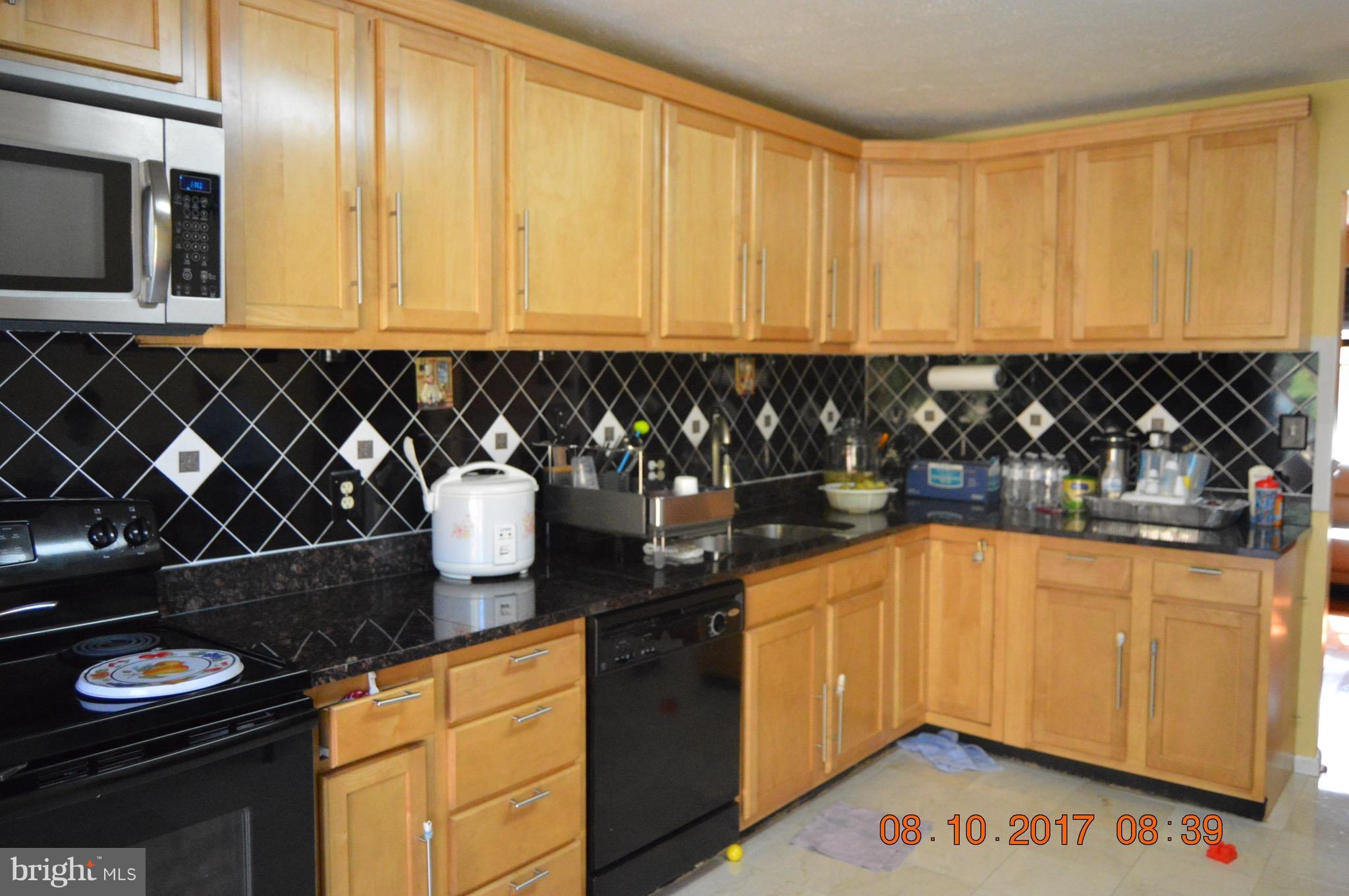 17 Rollwin Road Baltimore, MD 21244 - Photo 10 of 29 a kitchen with a sink and cabinets