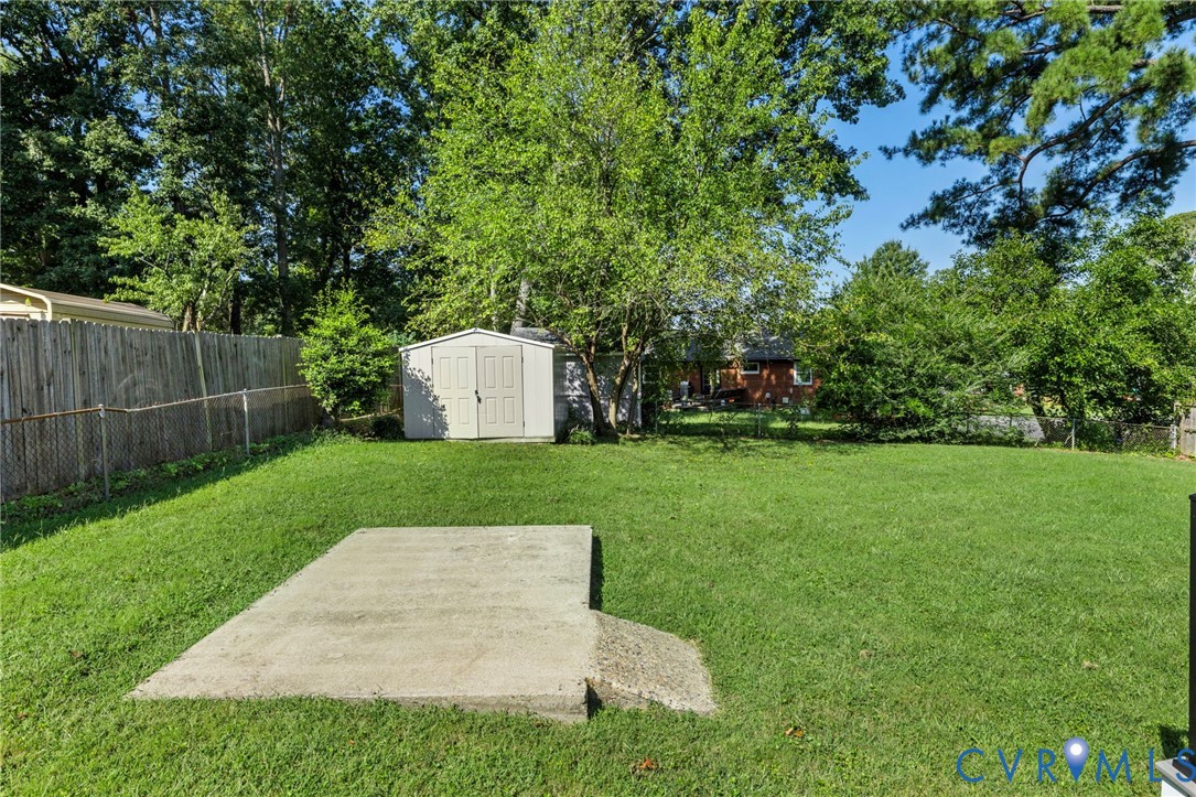 3006 Fortune Road Henrico, VA 23294 - Photo 23 of 26 Expansive rear yard featuring a concrete pad, stor