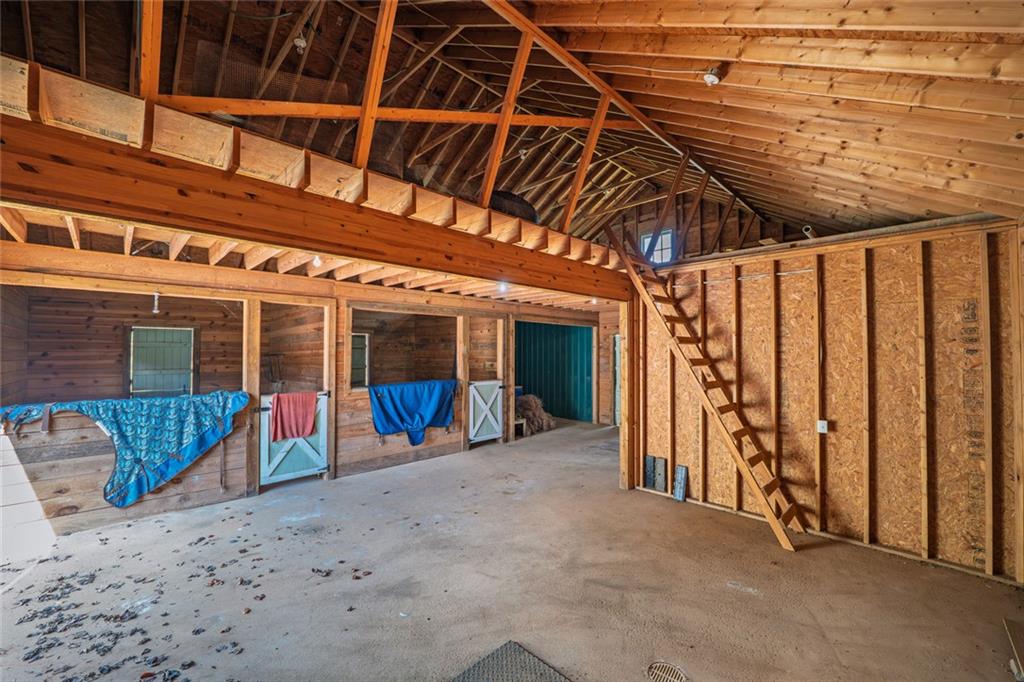250 Frank Bruce Road Dawsonville, GA 30534 - Photo 103 of 110 a view of a room with wooden walls