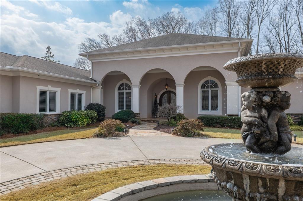 250 Frank Bruce Road Dawsonville, GA 30534 - Photo 2 of 110 a front view of house with yard