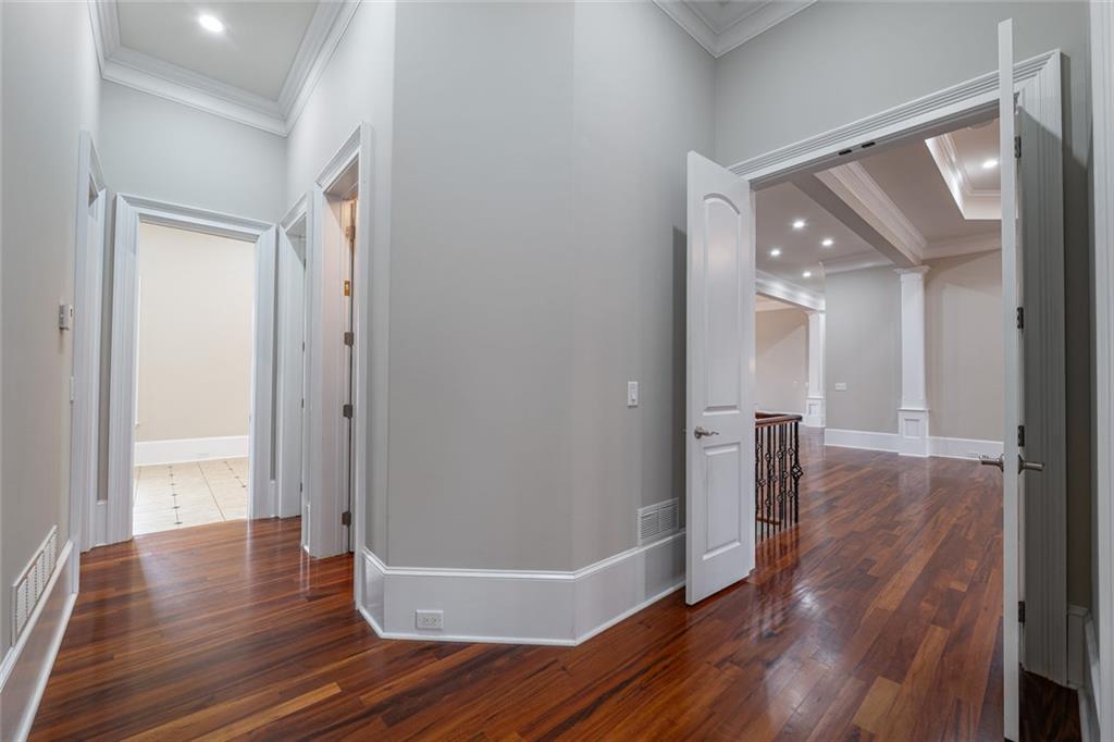 250 Frank Bruce Road Dawsonville, GA 30534 - Photo 22 of 110 a view of a hallway with wooden floor