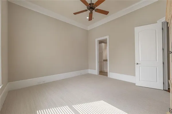 a view of a livingroom with furniture and a garage
