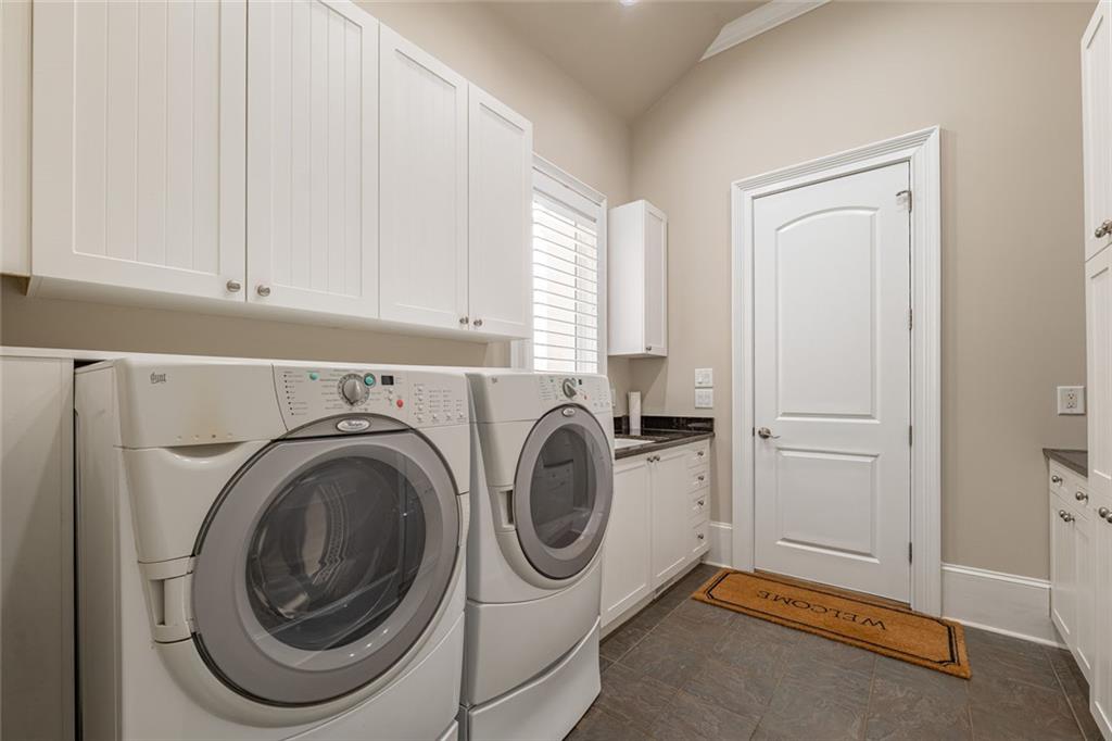250 Frank Bruce Road Dawsonville, GA 30534 - Photo 45 of 110 a utility room with dryer and washer