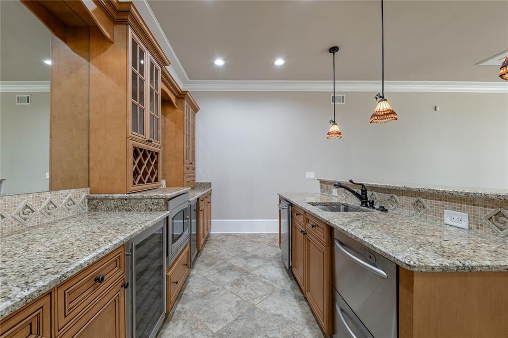250 Frank Bruce Road Dawsonville, GA 30534 - Photo 50 of 110 a bathroom with a granite countertop sink and a mirror