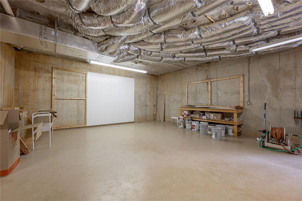 250 Frank Bruce Road Dawsonville, GA 30534 - Photo 67 of 110 a view of a room with table