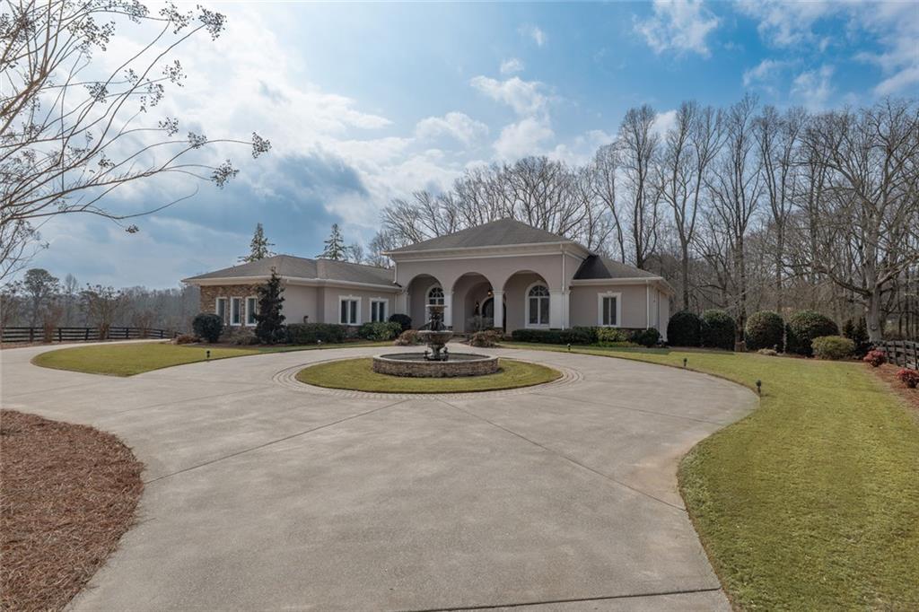 250 Frank Bruce Road Dawsonville, GA 30534 - Photo 76 of 110 a view of a house with swimming pool and a yard