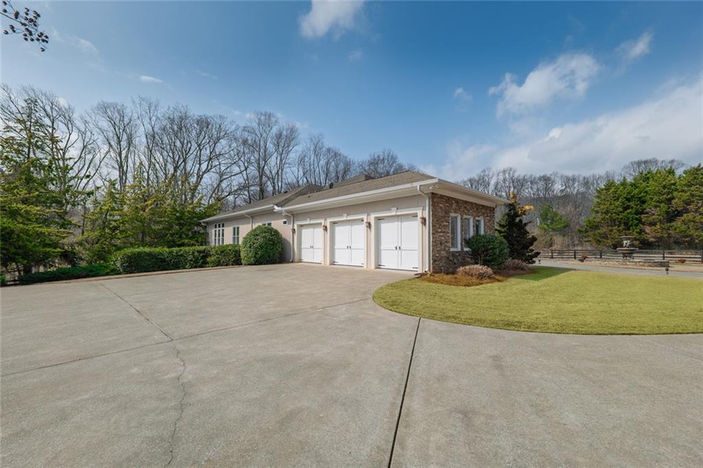 250 Frank Bruce Road Dawsonville, GA 30534 - Photo 79 of 110 a view of outdoor space yard and garage