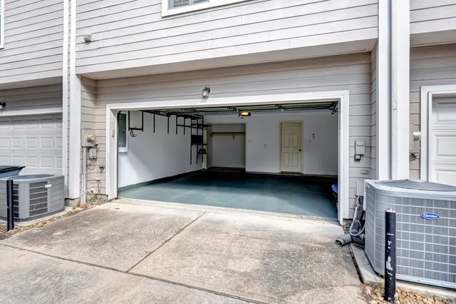 a view of a car garage of the building