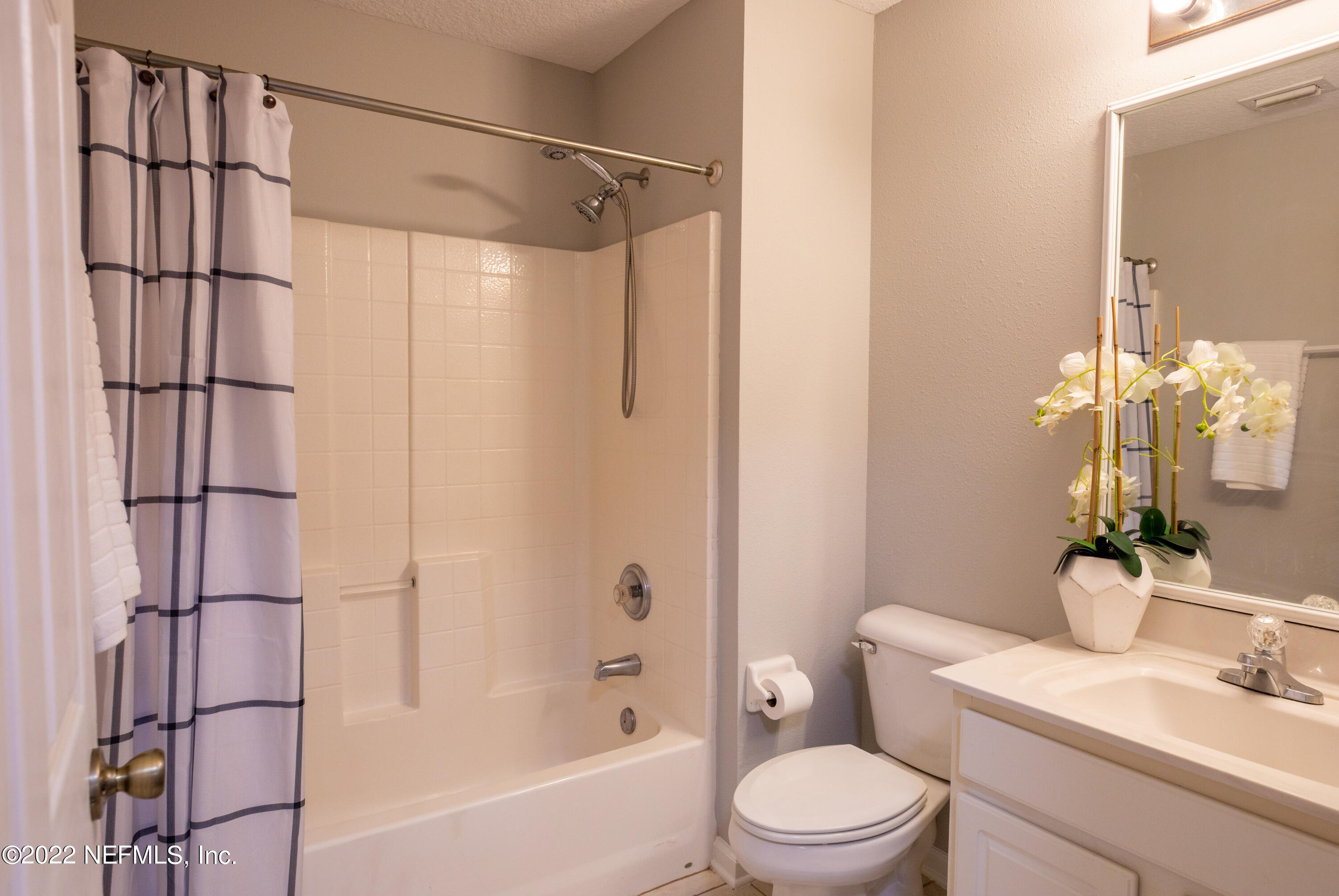 2067 North Cranbrook Avenue St. Augustine, FL 32092 - Photo 19 of 26 a bathroom with a sink a toilet and shower