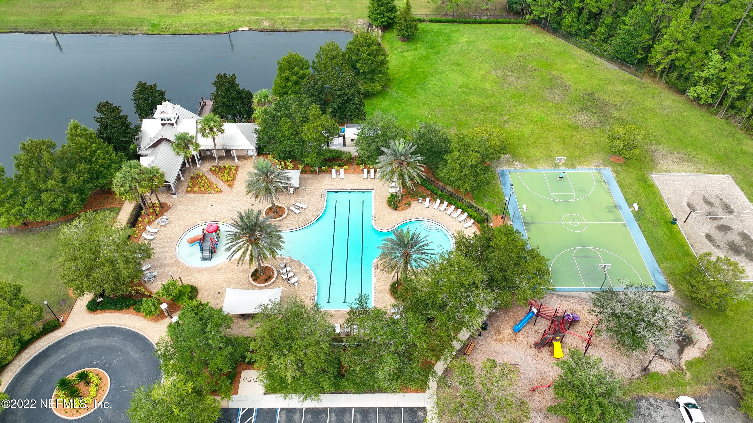 2067 North Cranbrook Avenue St. Augustine, FL 32092 - Photo 24 of 26 an aerial view of a house with swimming pool and garden