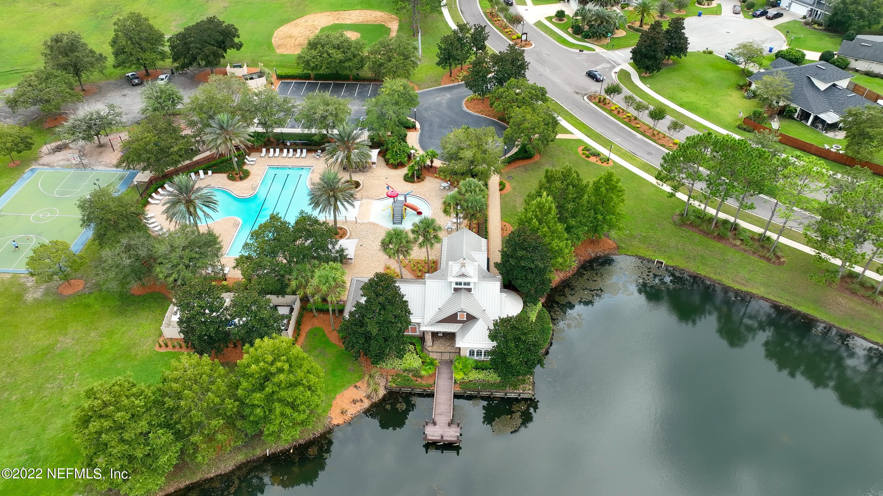 2067 North Cranbrook Avenue St. Augustine, FL 32092 - Photo 25 of 26 an aerial view of a house with a yard and lake view